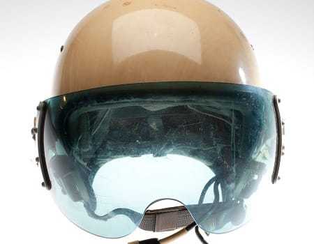 A close view of the blue-tinted visor on the Soviet pilot's helmet